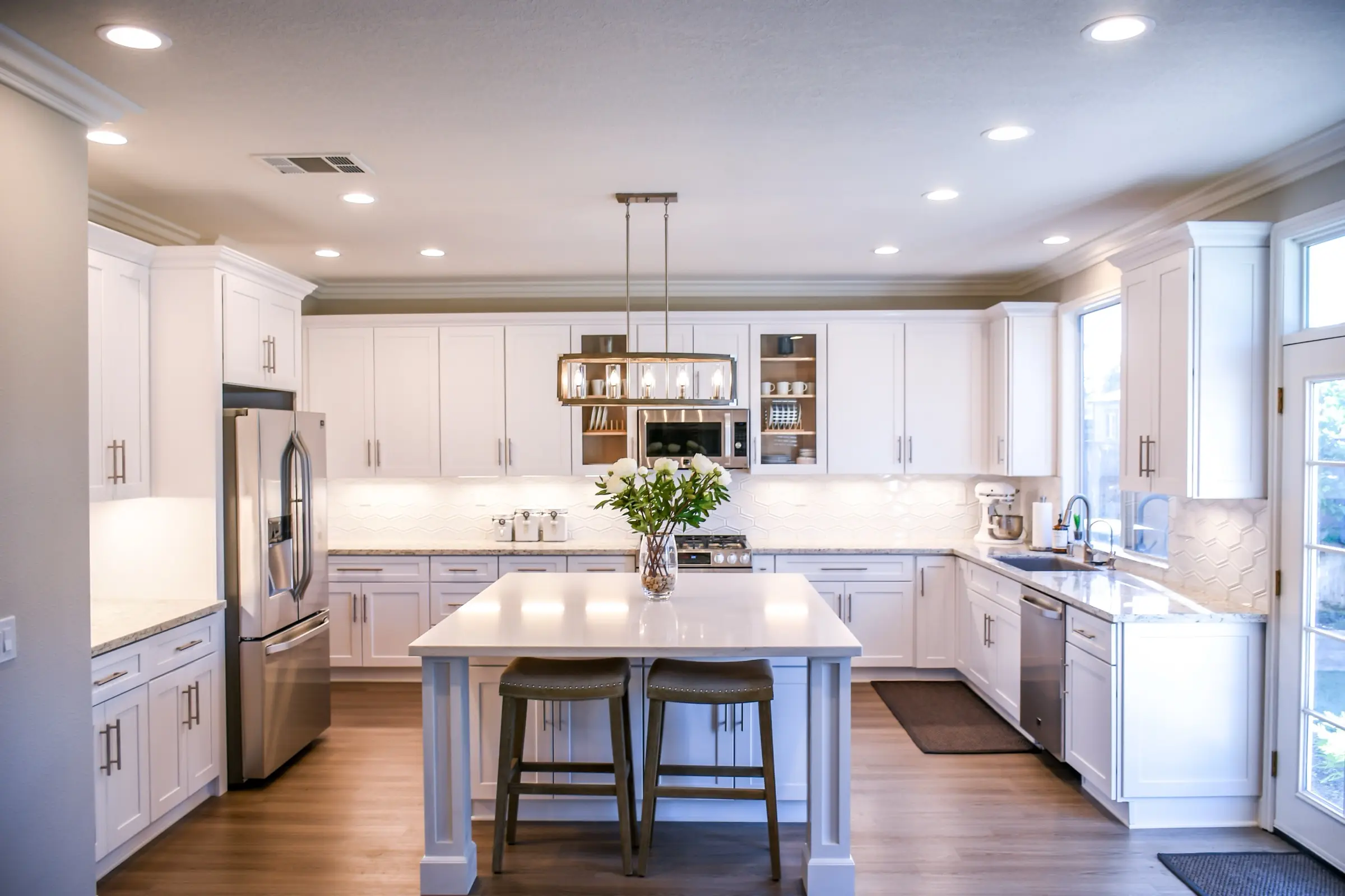 Kitchen with layered automated lighting scenes
